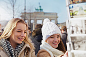 Teenage Girls Browsing Postcards, Berlin, Germany