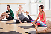 Group of People at Yoga Class Smiling