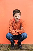 Portrait of Young Boy Crouching