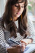 Woman Drawing, Close-up view