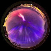 This is a 360° panorama of the May 10/11, 2024 great aurora display, when the Kp Index reached 8 this night bringing aurora to as far south as the southern U.S. Here, from my home in southern Alberta, Canada (latitude 51° N) it is exhibiting very odd vertical blue and magenta rays across the western (left), northern (bottom), and eastern (right) sky, and an odder bright patch to the south at top. This was toward the end of the main activity of the show for me this night, at about 2:30 am. These distinctive blue rays appeared like this only at this time after the main show died down. The colour