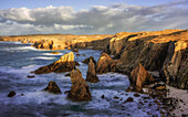 Mangersta Sea Stacks bathed in golden afternoon light, Isle of Lewis, Outer Hebrides, Scotland, United Kingdom, Europe