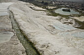 Travertine pools and terraces of The Cotton Castle of Pamukkale, UNESCO World Heritage Site, Anatolia, Turkey, Asia Minor, Asia