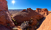 A rock island with a little rock window on its top called the Tea Pot Arch at Ferry Swale in the Glen Canyon Recreation Area near Page, Arizona, United States of America, North America