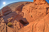 A dry waterfall at the base of a rock island at Ferry Swale in the Glen Canyon Recreation Area near Page, Arizona, United States of America, North America