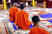 Buddhist monks praying to the Buddha, Munirensay Buddhist Temple, Can Tho, Vietnam, Indochina, Southeast Asia, Asia