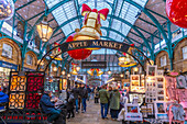 View of Christmas decorations in the Apple Market, Covent Garden, London, England, United Kingdom, Europe