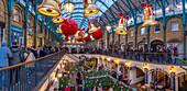 View of Christmas decorations in the Apple Market, Covent Garden, London, England, United Kingdom, Europe