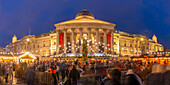 View of Christmas market and The National Gallery in Trafalgar Square at dusk, Westminster, London, England, United Kingdom, Europe