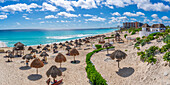 View of long white sandy beach at Playa Delfines, Hotel Zone, Cancun, Caribbean Coast, Yucatan Peninsula, Mexico, North America