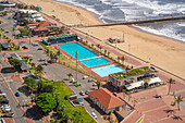 Elevated view of outdoor swimming pool on promenade, Durban, KwaZulu-Natal Province, South Africa, Africa