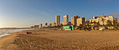 View of promenade, beach and hotels from pier in Indian Ocean at sunrise, Durban, KwaZulu-Natal Province, South Africa, Africa