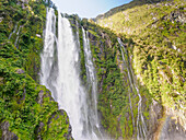 Waterfall on Milford Sound, Fiordland National Park, Te Wahipounamu, UNESCO World Heritage Site, South Island, New Zealand, Pacific