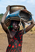 Mundari woman on the way to a water hole, Mundari tribe, South Sudan, Africa