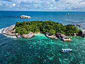 Aerial of little Keciput granite rock island, Belitung island off the coast of Sumatra, Indonesia, Southeast Asia, Asia