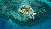 Aerial of rocks in the sea, Lengkuas Island, Belitung Island off the coast of Sumatra, Indonesia, Southeast Asia, Asia