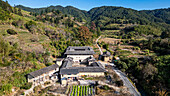 Aerial of the Hekeng Fujian Tulou, UNESCO World Heritage Site, rural dwelling of the Hakka, Fujian, China, Asia