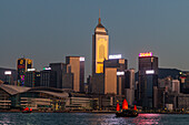 Traditional sailing boat in front of high rise buildings in Central Hongkong, China, Asia