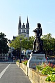 France, Maine et Loire, Angers, Beaurepaire statue on Verdun bridge over the Maine river and Saint Maurice cathedral