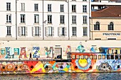 France, Rhone, Lyon, Quai du Maréchal Joffre, mytoc.fr barge, a 38-meter work of art, is a cultural platform moored on the banks of the Saone river