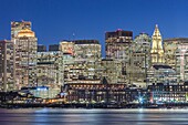 United States, New England, Massachusetts, Boston, city skyline from Boston Harbor, dusk