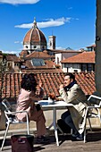 Italy, Tuscany, Florence, listed as World Heritage by UNESCO, the Duomo Santa Maria del Fiore seen from the Hospital of the Innocent café (Spedale degli Innocenti)