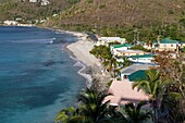 West Indies, British Virgin Islands, Tortola Island, view of Cappoons Bay Beach, between beach and road1 some houses