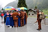 Switzerland, Valais Canton, Val d'Herens, village of Evolene at fall, CIME festival where are performed many folkloric activities