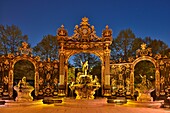 France, Meurthe and Moselle, Nancy, place Stanislas (former Place Royale) built by Stanislas Leszczynski, king of Poland and last duke of Lorraine in the eighteenth century, classified World Heritage of UNESCO, foutain of Neptune by night