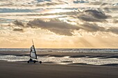 France, Somme, Marquenterre, Quend-Plage, The large sandy beaches of the windswept coast of Picardy are an ideal place for the practice of the sail-hauler, at sunset