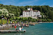 France, Haute Savoie, Annecy, the lakeside pontoons at Menthon Saint Bernard and the 5 star hotel Palace