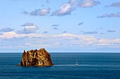 Italy, Sicily, Aeolian Islands, listed as World Heritage by UNESCO, Stromboli island, islet of Strombolicchio, rock of solidified magma from an old volcanic cap, now occupied by a lighthouse