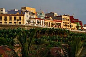 Spain, Canary Islands, La Palma, Tazacorte, view of a colonial style village at sunset