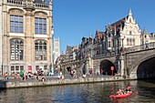 Belgium, East Flanders, Ghent, Graslei (Quai aux Herbes), along the Lys, old post office and Saint Bavon cathedral in background