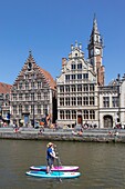 Belgium, East Flanders, Ghent, Graslei (Quai aux Herbes), along the Lys, tourist boats and rich old houses that housed commercial guilds