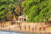 Cameroon, South Region, Ocean Department, Kribi, African boys playing football on the beach