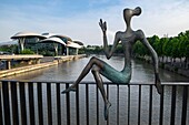 Georgia, Tbilisi, Baratashvili Bridge over Kura river and bronze sculptures by sculptor Gia Japaridze, the Public Service Hall in the background