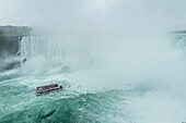 Canada, Ontario, Niagara Falls, boat tour in front of Niagara Falls