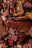 Detailed close-up photo capturing the juicy and tender texture of smoked barbecue brisket