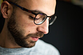 Tilburg, Netherlands. Studio shot portrait of Ammar, a Syrian refugee with valit and legal status to build his life in Holland, suffering from depressed state of mind.