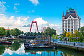 Rotterdam, Netherlands. Daytime view on Oude Haven with historical ships and buildings.