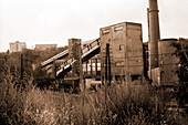 Factory located in the outskirts of the capitol, just after the fall of communism, early 1990's. Much of the communistic industry has become obsolete and old and is replaced by modern production facilities. Shot on analog Black & White film on 1991. Prague, TsjechiÃ«, Czech Republic.