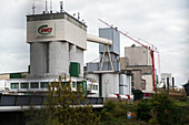 Huge, heavy steel production plant and industry terrain, producing various kinds of steel inside an CO2 Emitting and Exhausting Factory. IJmuiden, Netherlands.