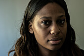 Studio Portrait of a Young Adult, Colored Woman born in the Caribbean. Tilburg, Netherlands.