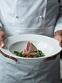 Cooked seasoned tuna and aubergine dish