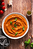 Bowl of fresh tomato sauce with basil, garlic and oil