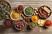 Group of Herbs & Spices on a Dark Wooden Background