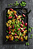 Roast potatoes made from small red potatoes, refined with lava salt from the Westfjords of Iceland and fresh spruce shoots