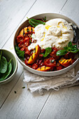 grilled peach and tomato salad with burrata