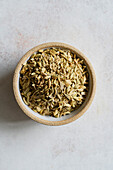 Small bowl of fennel seeds